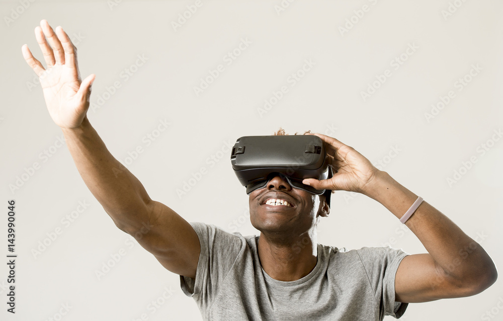 afro american man wearing virtual reality vr 360 vision goggles enjoying video game afro american man wearing virtual reality vr 360 vision goggles enjoying video game