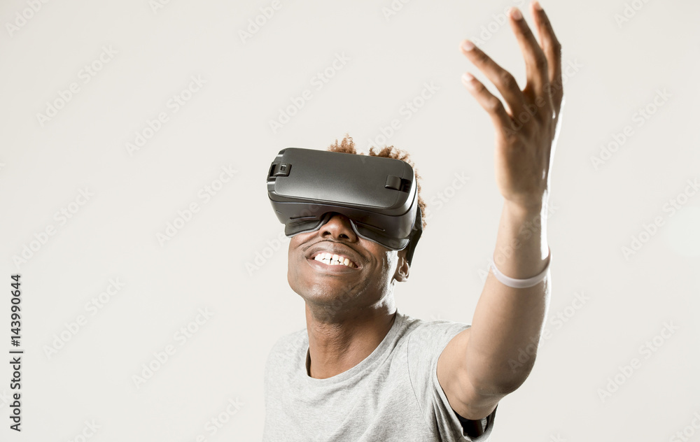 afro american man wearing virtual reality vr 360 vision goggles enjoying video game afro american man wearing virtual reality vr 360 vision goggles enjoying video game