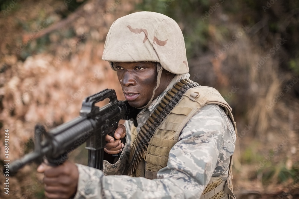 Fototapeta premium Military soldiers during training exercise with weapon