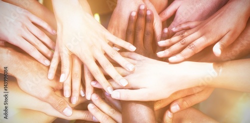 Quadro su tela Friends putting their hands together