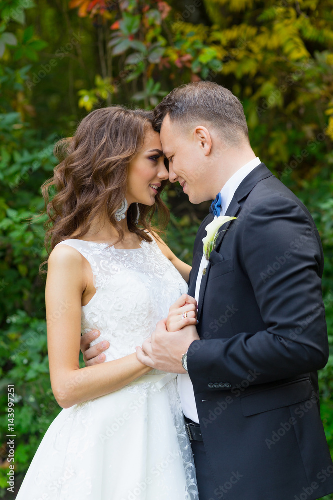 Elegant curly bride and stylish groom Elegant curly bride and stylish groom