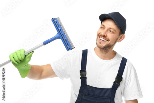 Young window cleaner on whi...
