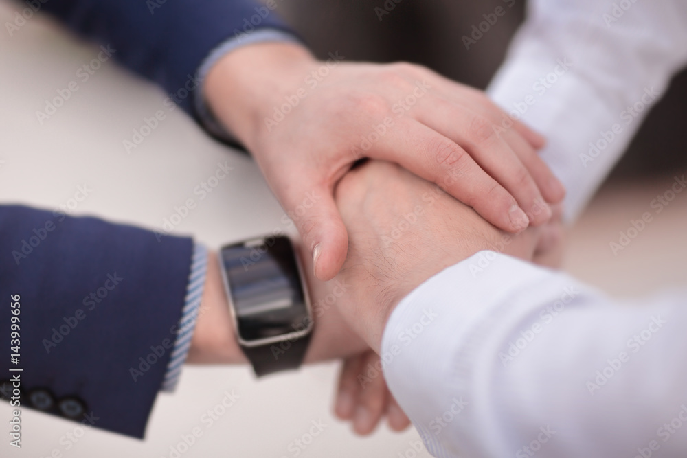 Business group with hands together -