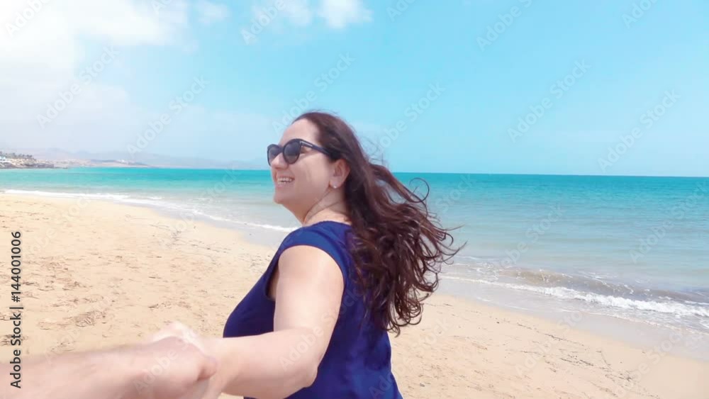High quality video of happy couple running at the beach in real 1080p slow motion 120fps High quality video of happy couple running at the beach in real 1080p slow motion 120fps