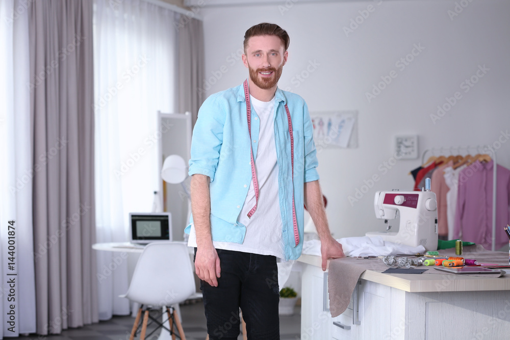 Young fashion designer in office Young fashion designer in office