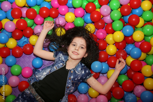 Cute girl playing with plas...