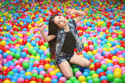Cute girl playing with plas...