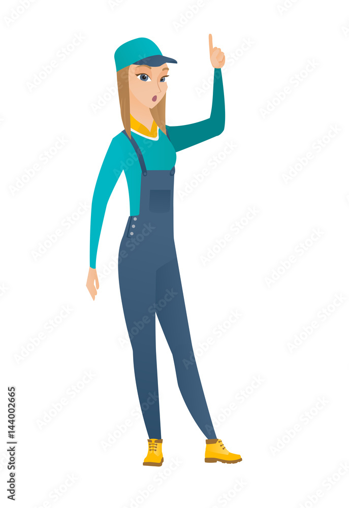 Mechanic with open mouth pointing finger up. Mechanic with open mouth pointing finger up.