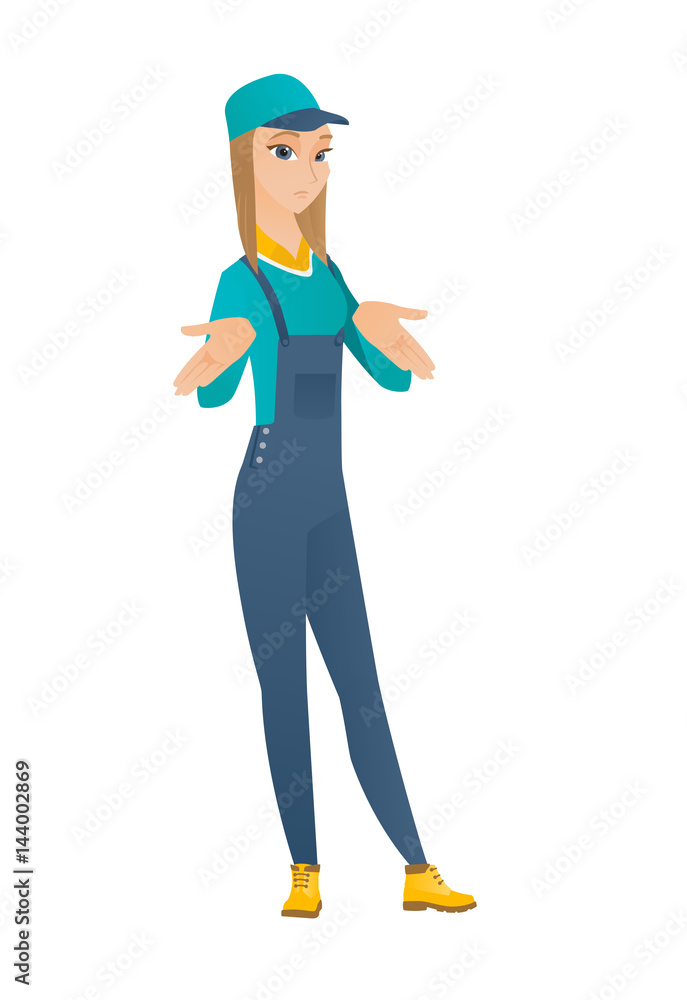 Caucasian confused mechanic shrugging shoulders. Caucasian confused mechanic shrugging shoulders.