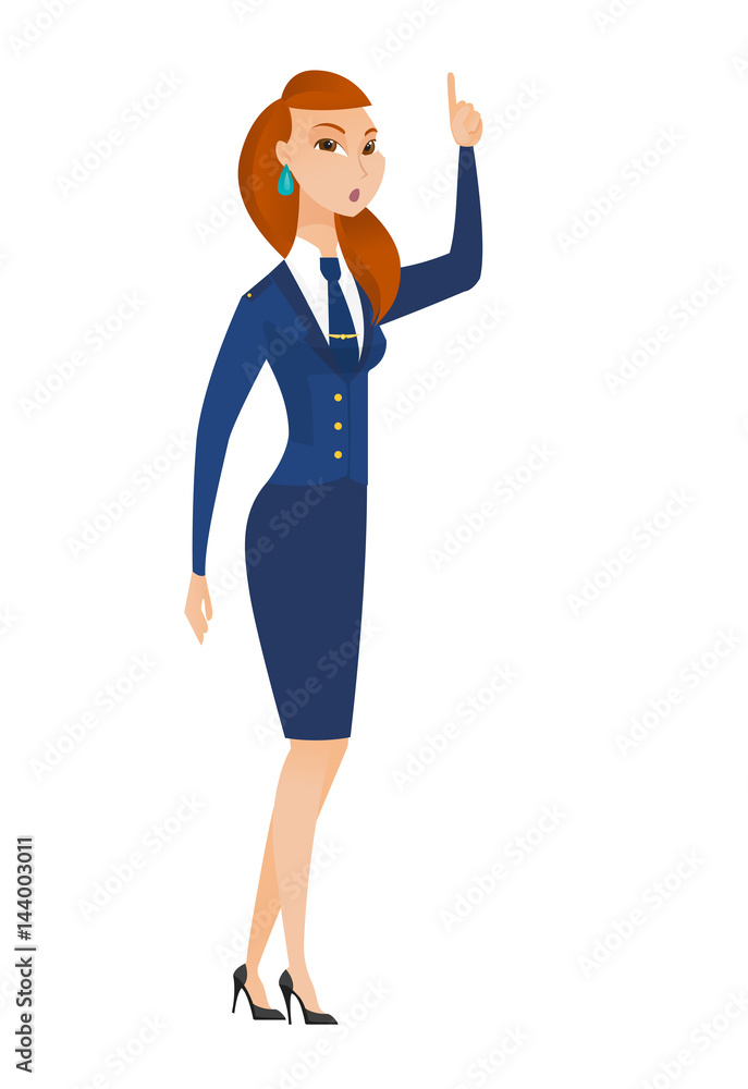 Stewardess with open mouth pointing finger up. Stewardess with open mouth pointing finger up.