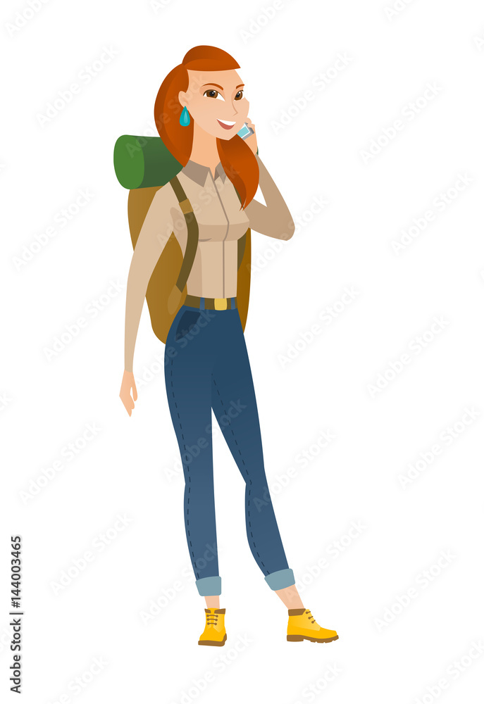Traveler woman talking on a mobile phone. Traveler woman talking on a mobile phone.