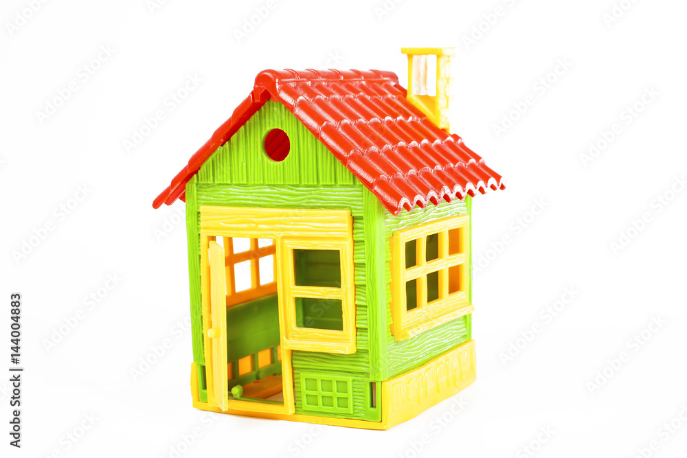 Green house. Plastic toy house for every concept. Isolated white studio photo. Green house. Plastic toy house for every concept. Isolated white studio photo.