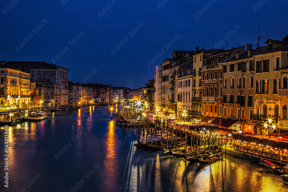 Looking out from Venice's Rialto Bridge at twilight