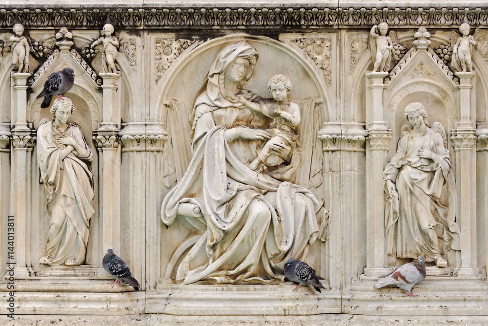 Marble statue of Madonna and Child on the Fonte Gaia of the Piazza del Campo in Siena, Italy