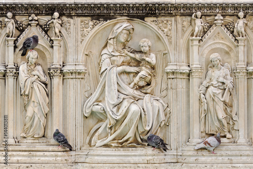 Marble statue of Madonna and Child on the Fonte Gaia of the Piazza del Campo in Siena  Italy