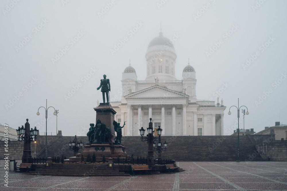 Fototapeta premium Statue of emperor Alexander II and Helsinki Cathedral, Finland