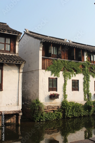 China Chinese House Houses Home Homes Water Town Watertown Jiangsu Zhouzhuang Asia Asian Venice of Wood Wooden Window Windows White Wall Walls Door Doors Green Plant Plants  © Kim