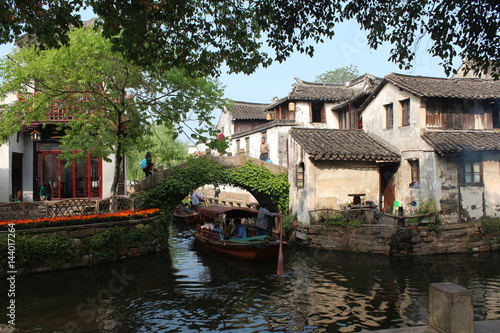 China Chinese Water Town Watertown Jiangsu Zhouzhuang Traditional Tradition Boat Boats Bridge Bridges Home Homes Houses House Blue Sky Green Tree Trees Scene Corner Asia Asian
