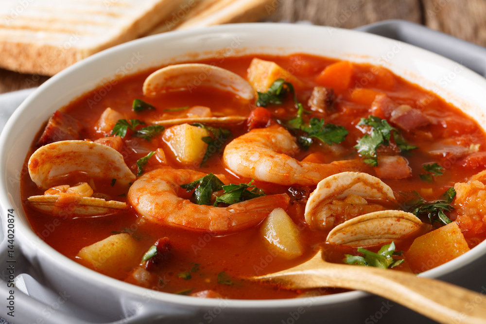 American cuisine: Manhattan clam chowder soup macro. horizontal American cuisine: Manhattan clam chowder soup macro. horizontal