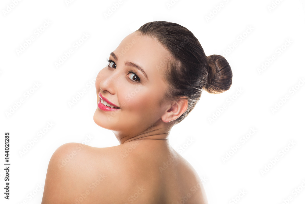 beautiful brunette girl with delicate make-up on white background smiling looking at the camera from behind turning his head joy happiness Spa care skin cream freshness beautiful brunette girl with delicate make-up on white background smiling looking at the camera from behind turning his head joy happiness Spa care skin cream freshness