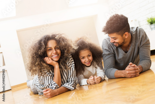 Happy family smiling and enjoying together
