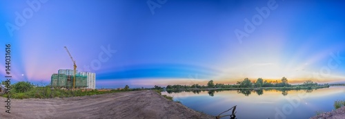 Sunset panorama along the river as the sun down to sun rays projection horizon so dramatic both the east and west end of a sunny day.