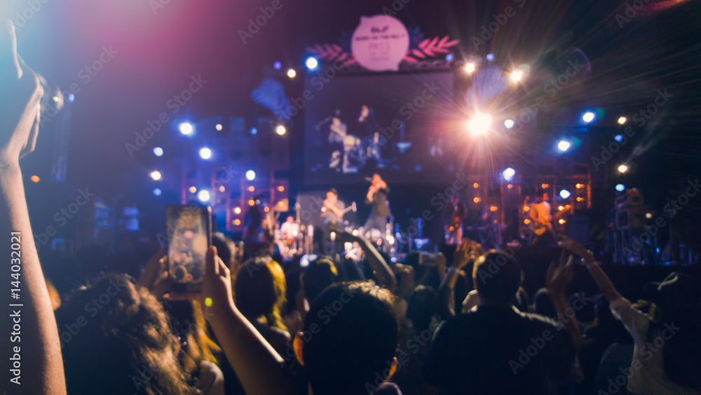 Fototapeta premium Silhouettes of concert crowd