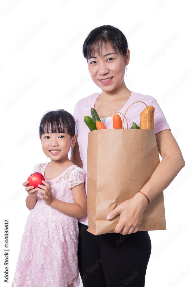 Asian Woman and daughter carrying groceries Asian Woman and daughter carrying groceries