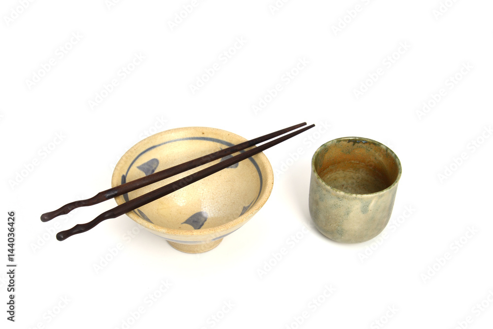 Fototapeta premium Japanese rice bowl with chopsticks and tea cups