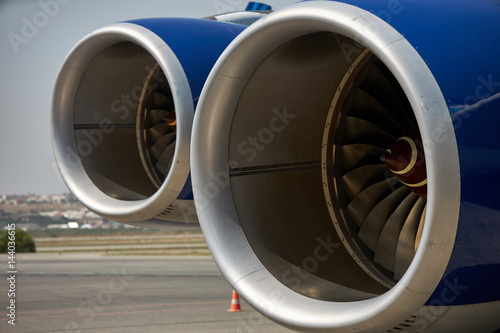 A airplane turbine detail view inside a large high power jet engine Turbine of airplane, closeup.