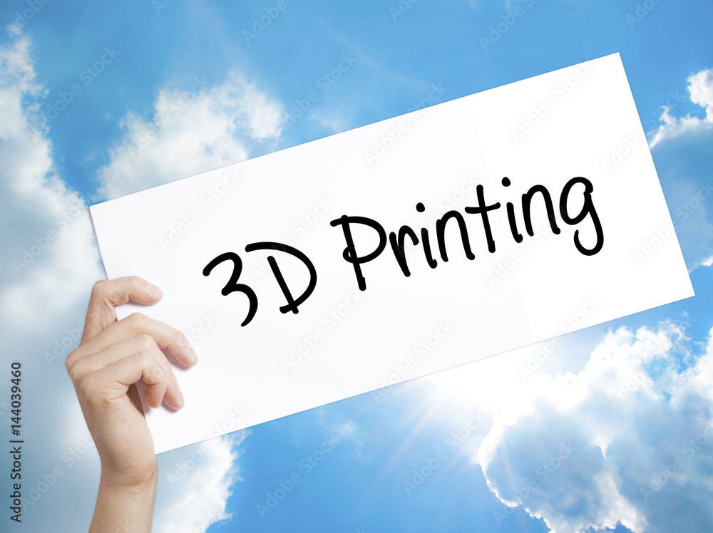 3D Printing Sign on white paper. Man Hand Holding Paper with text. Isolated on sky background. 3D Printing Sign on white paper. Man Hand Holding Paper with text. Isolated on sky background.