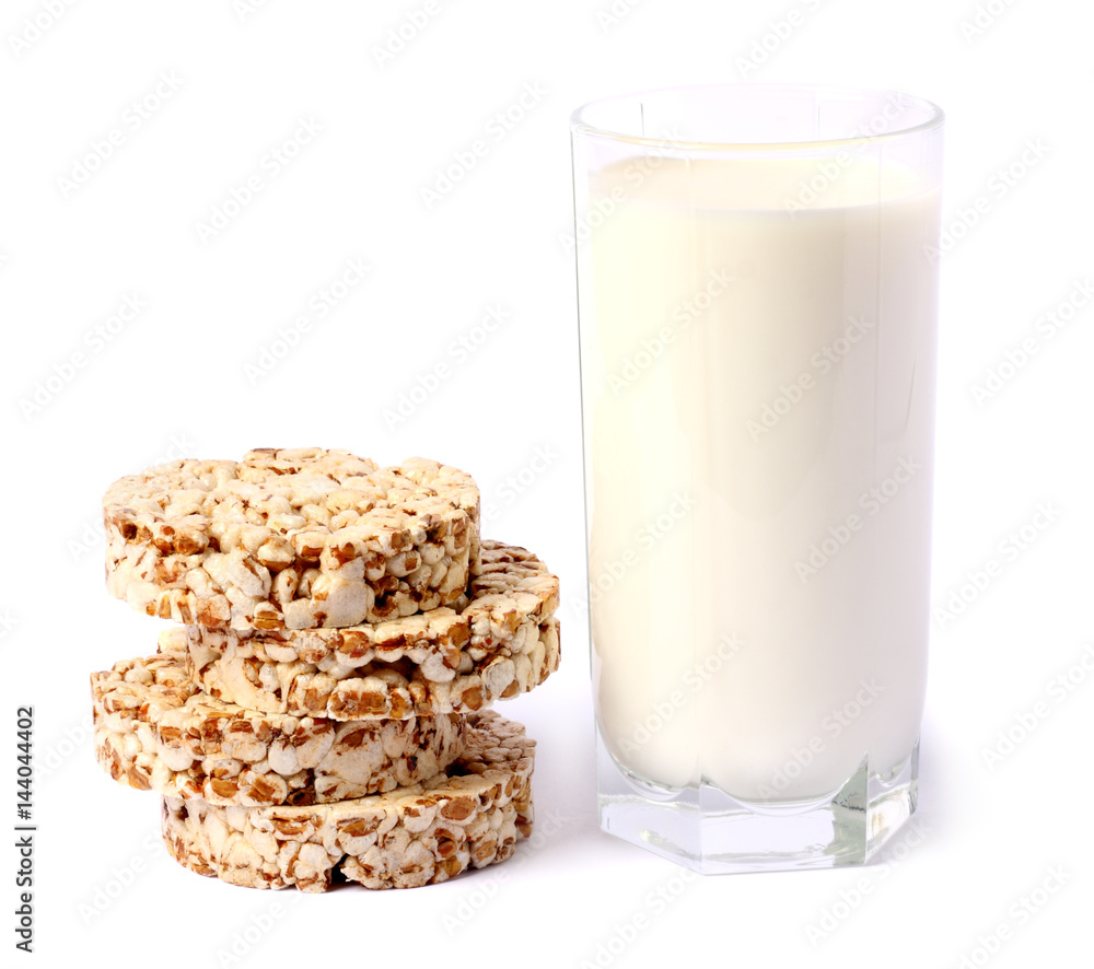 Glass of fresh milk with biscuit isolated on white background Glass of fresh milk with biscuit isolated on white background