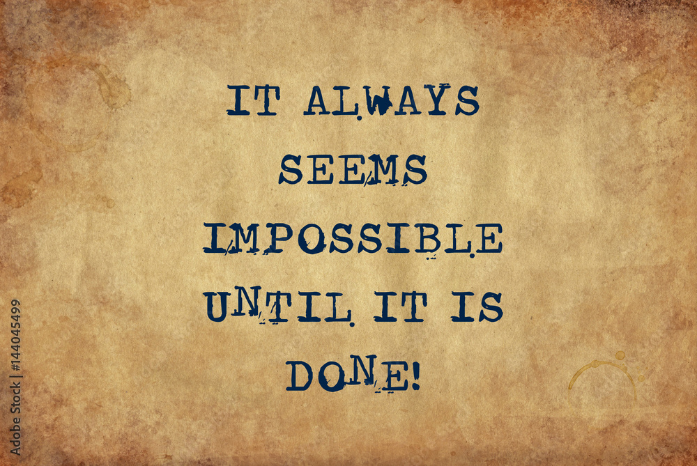 Inspiring motivation quote of it always seems impossible until it is done with typewriter text. Distressed Old Paper with Typing image.