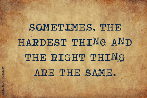 Fényképezés Inspiring motivation quote of sometimes, the hardest thing and the right thing are the same with typewriter text
