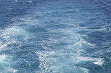 Sea waves from the engine of the boat. Marine vacation background