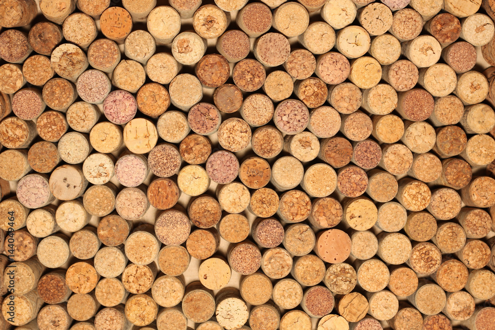Wine corks background horizontal / used wine corks / many wine corks / closeup of a wall of used wine corks Wine corks background horizontal / used wine corks / many wine corks / closeup of a wall of used wine corks