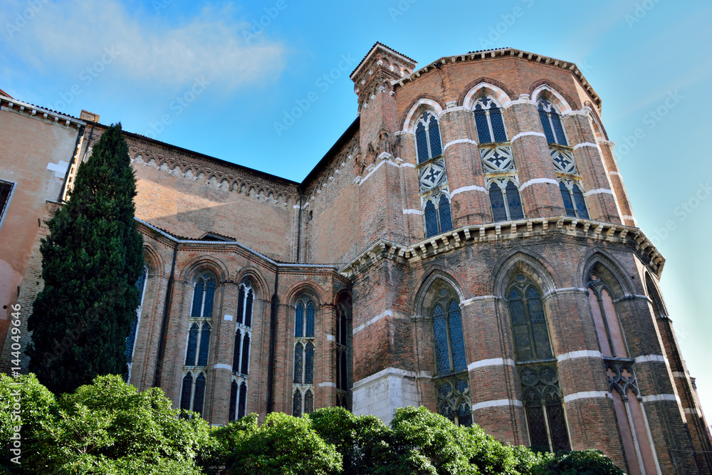Facade exterior of red brick, gothic style church of Santa Maria Gloriosa Dei Frari in San Polo district, Venice, Italy