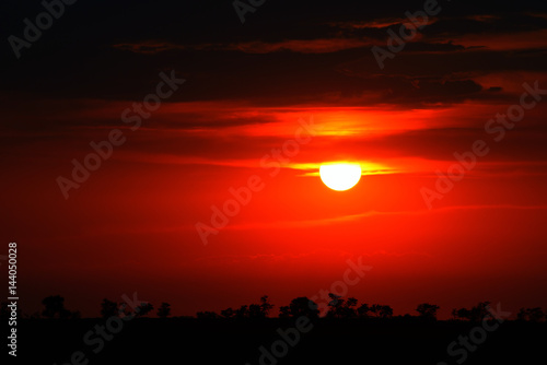 Bright red sunrise on sky