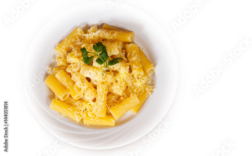 rigatoni pasta with cheese in a plate. top view. isolated on white
