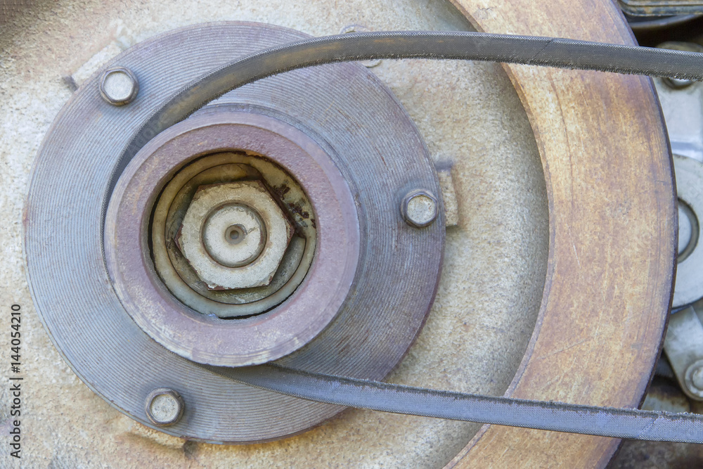 Pulley belt of a small old tractor. Pulley belt of a small old tractor.