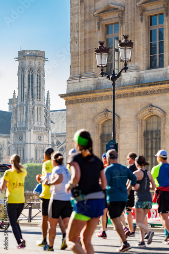 Paris Marathon 2017 runners at rue de Rivoli in Paris