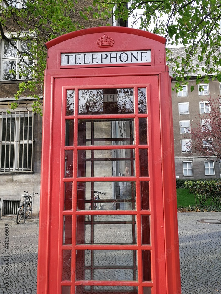 Typical vintage British red phone boxes