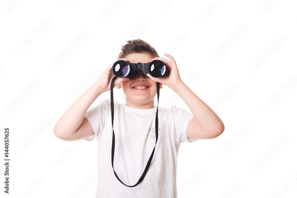 little boy is looking through binoculars. Isolated over white