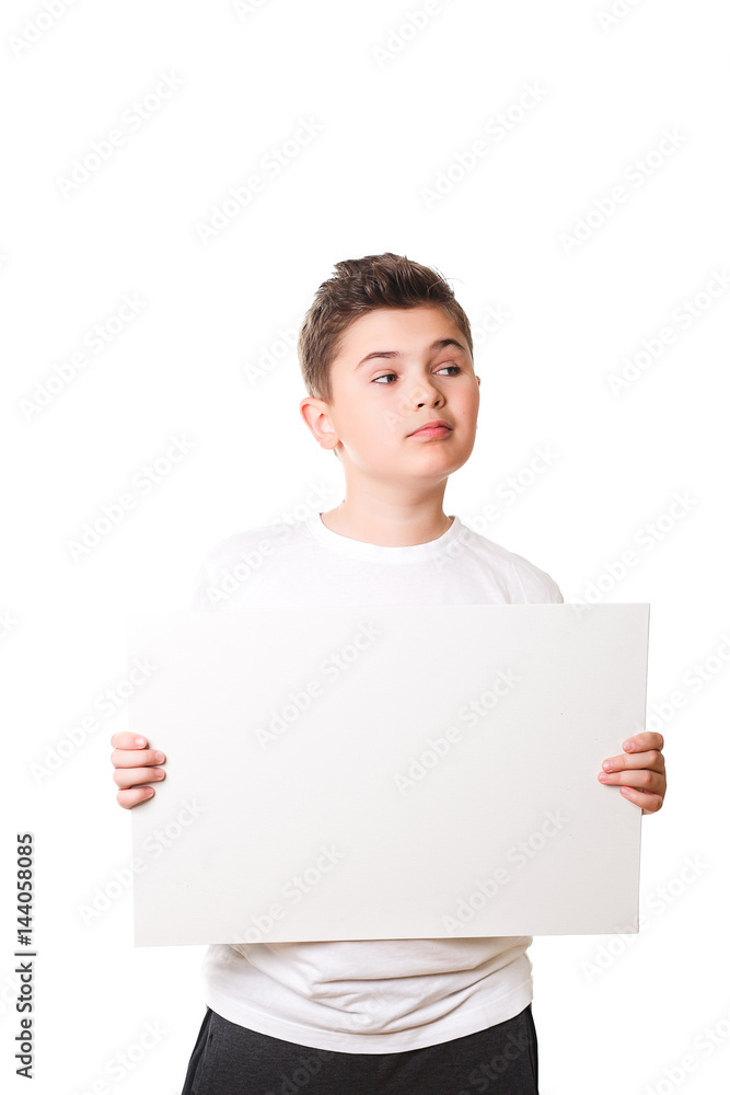 Funny little boy holding a large white plate for your text Funny little boy holding a large white plate for your text