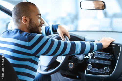 Принти на полотні Happy male customer in a newly bought car