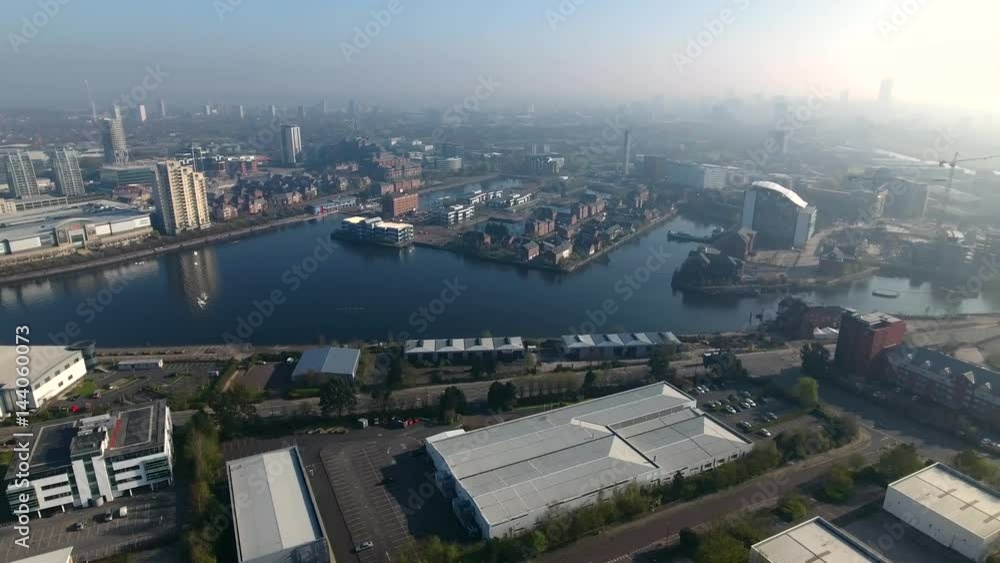 Panning aerial view of Salford Quays in Manchester, UK. Panning aerial view of Salford Quays in Manchester, UK.