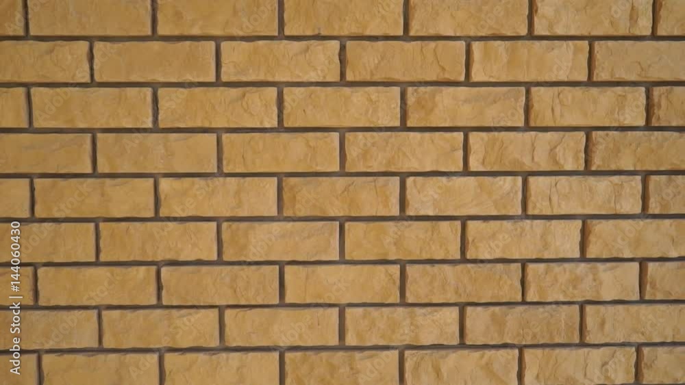 Beautiful facade of a private house. External wall finishing. Decorative brick Beautiful facade of a private house. External wall finishing. Decorative brick