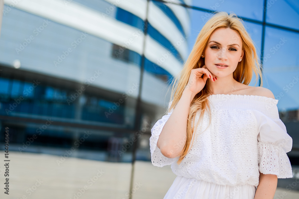 Fototapeta premium portrait of a beautiful girl in the street