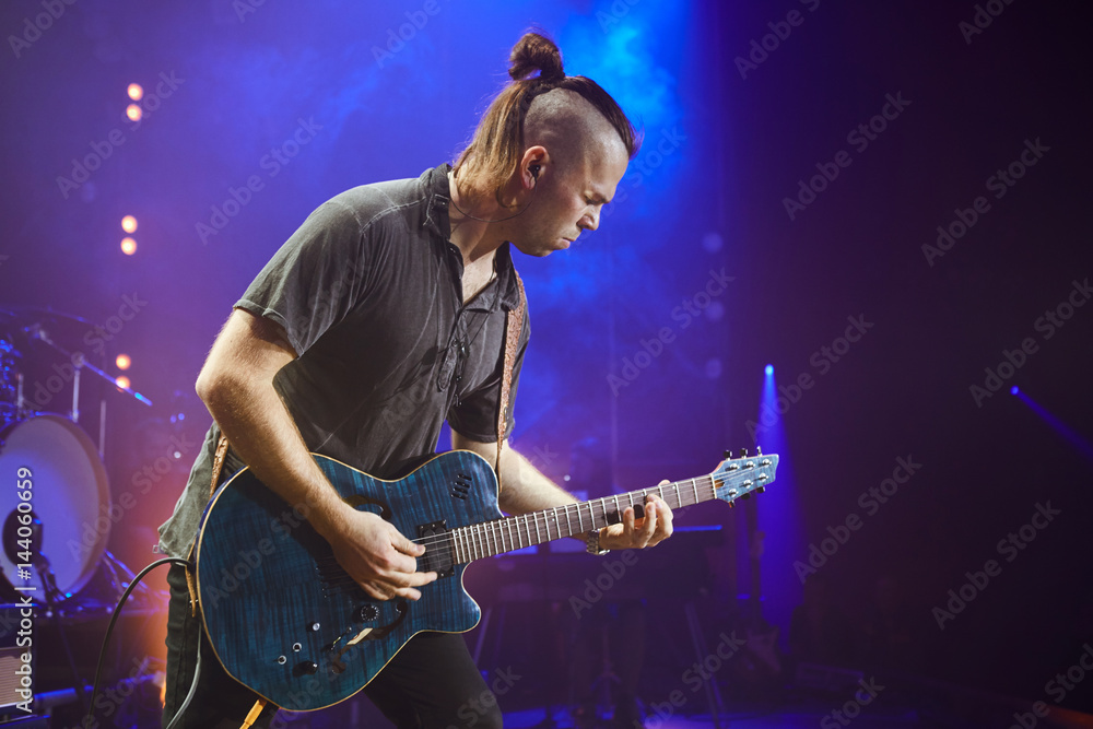 Obraz premium Guitarist performing on stage. Concert.