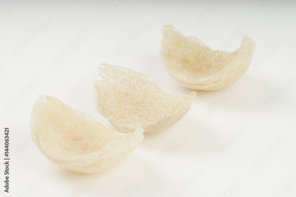 Fresh edible bird's nest on white paper Fresh edible bird's nest on white paper